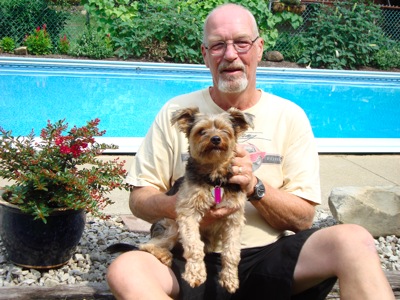 Larry and Captain poolside