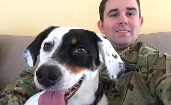 Oversized lap dog completes Army family