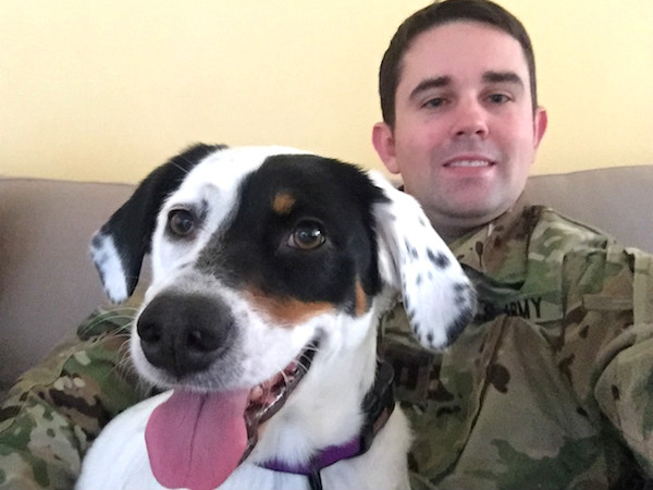 Oversized lap dog completes Army family