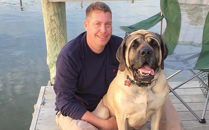 After a life at sea Navy veteran comes home to abused rescue dog