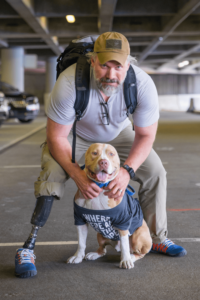 Multi-tour combat veteran and amputee rescues disfigured bait dog who was left for dead