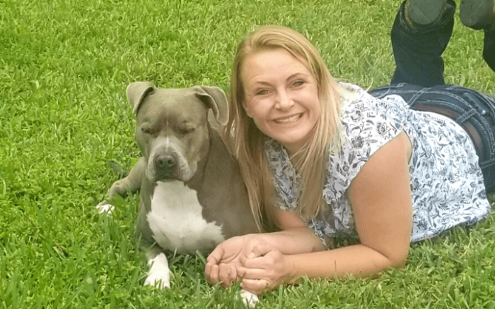 Young Navy veteran wins fight of her life with old rescue dog at her bedside