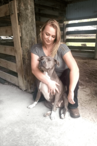 Young Navy veteran wins fight of her life with old rescue dog at her bedside