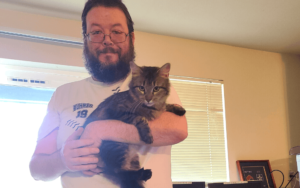 Rescue cat and support network uplift Iraq war veteran coping with loneliness of divorce