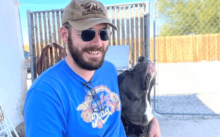 Marine veteran rescues giant dog who loves parties and people clothes